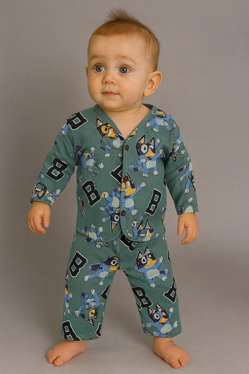 A cosy green jabla set covered in playful cartoon dog prints—perfect for keeping your little one comfy, stylish, and full of charm!