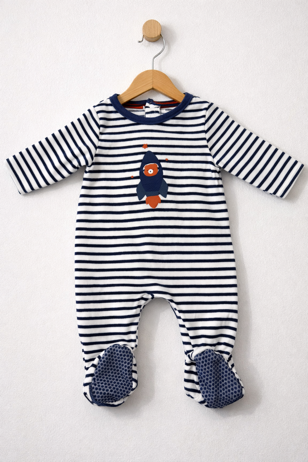 White with navy blue stripes. -Baby full Jumpsuit