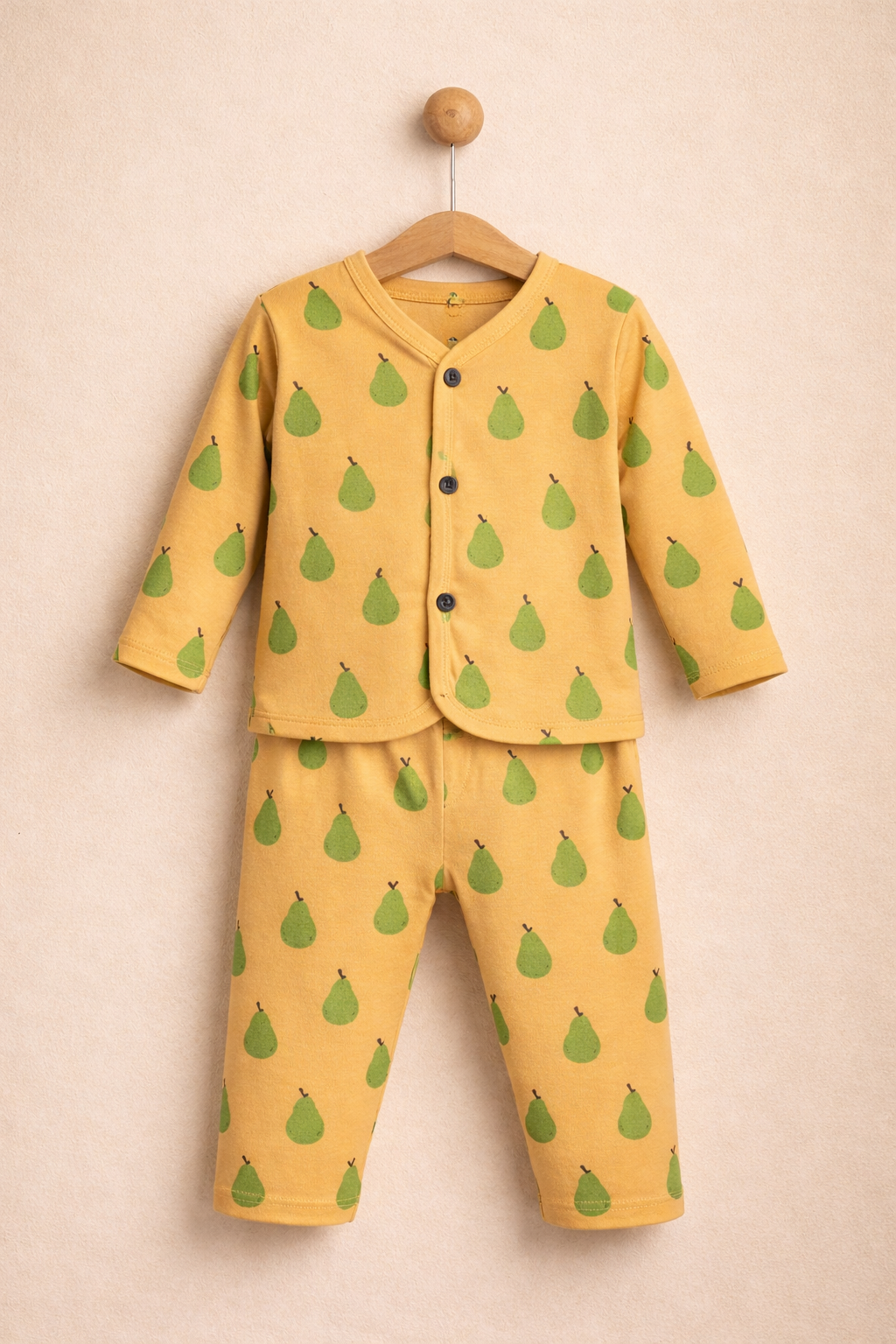 A soft peach jabla set sprinkled with adorable green pears